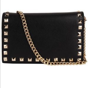 Brand new Inzi black and gold clutch